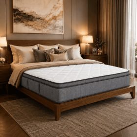 Grey 27 cm mattress with white quilted surface on wooden bed in luxury bedroom